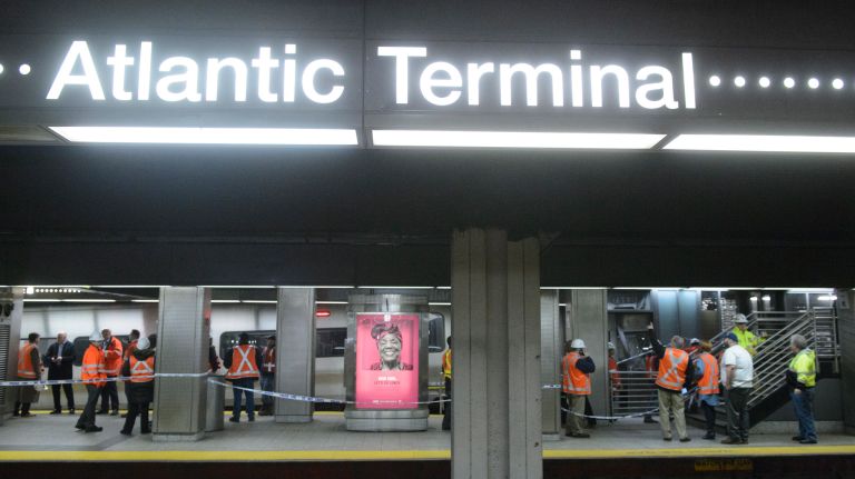 LIRR train crashes at Atlantic Terminal: See photos 8 Rail personnel and investigators examine a train that hit a bumper block at Atlantic Terminal in Brooklyn on Wednesday, Jan. 4, 2017.