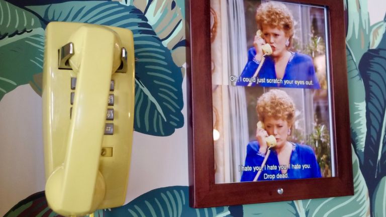 'Golden Girls' cafe Rue La Rue has soft opening in Washington Heights 20 The yellow phone found in the ladies' home now hangs on the walls of Rue La Rue -- along with photos of it in action.