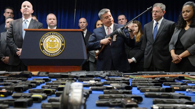 Guns on display during a news conference on Wednesday, March 8, 2017, announcing the seizure of 217 firearms in a weapons-smuggling bust.