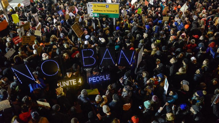 Protesters rally during a demonstration at JFK on Jan. 28, 2017, the day after President Donald Trump signed an executive order barring non-U.S. citizens from seven Muslim-majority nations from entering the country.
