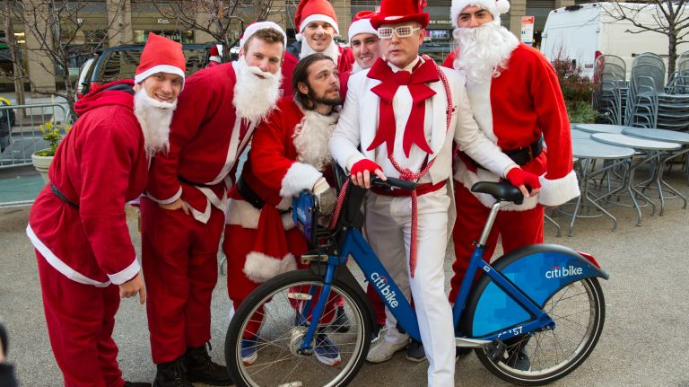 People gather for the start of SantaCon on East 23rd Street and Broadway in Manhattan on Dec. 10, 2016.