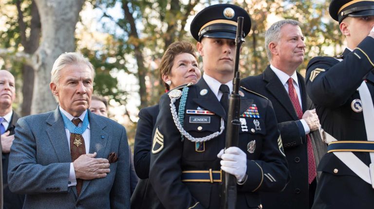 Medal of Honor recipient Paul Bueha, NYC Commissioner of Veterans Affairs Lorrie Sutton and Mayor Mike De Blasio are behind the honor guard. The New York City Veterans Day Parade, also knows as America's Parade, on Nov. 11, 2016, marched up Fifth Avenue after a wreath was placed at the Eternal Light Monument at Madison Square Park on 26th St.