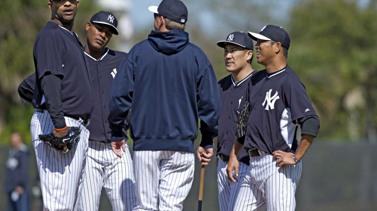 Yankees pitchers CC Sabathia, Ivan Nova, Masahiro Tanaka and Hidoki Kuroda work out at Steinbrenner Field in Tampa, Fla. on the morning of Feb. 15, 2014.