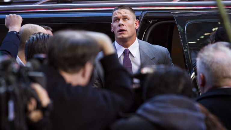 WWE superstar John Cena arrives at the Hard Rock Cafe in Manhattan Tuesday, April 1, 2014, as they kick off Wrestlemania 30 during a week long list of activities leading to the April 6th main event.