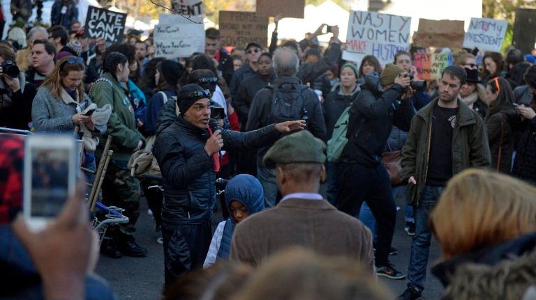 People take turns speaking during an rally in Union Square on Saturday, Nov. 12, 2016, before a march uptown to protest policies of President-elect Donald Trump.