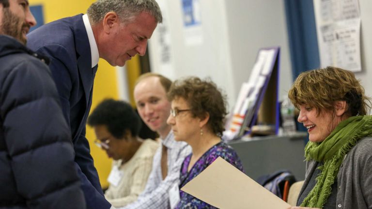 Mayor Bill de Blasio casts his ballot at the Brooklyn Public Library's Park Slope branch on Sixth Avenue on Nov. 8, 2016.