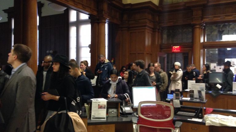 A long line of voters wait to cast their ballots at the Brooklyn Public Library in Park Slope on Nov. 8, 2016. 