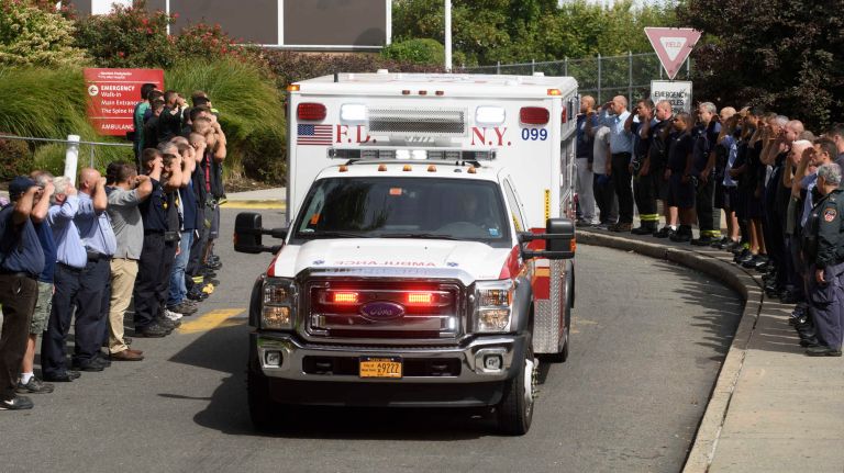 FDNY Battalion Chief Michael Fahy honored at bunting ceremony: See photos 10 Members of the FDNY and others salute as an ambulance transports the body of Fahy from NewYork-Presbyterian Allen Hospital in Manhattan on Tuesday, Sept. 27, 2016.