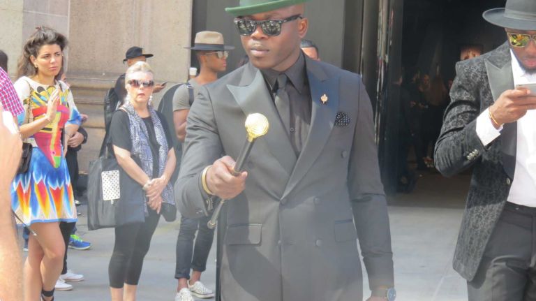 A guest shows off his street style accessory before the Vera Wang show at the Skylight at Moynihan Station in Manhattan during New York Fashion Week on Tuesday, Sept. 13, 2016.