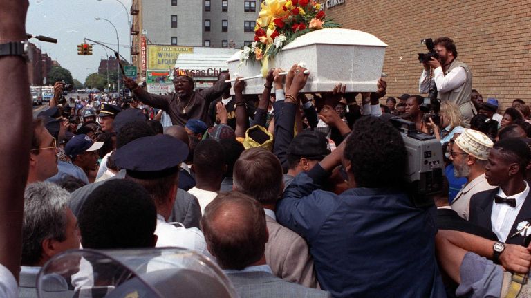 The accident sparked reactions from community activists, including the Rev. Al Sharpton and Sonny Carson. The photo above shows Carson shouting to the crowd to not forget the circumstances of Gavin Cato's death at his funeral at St. Anthony's Baptist Church in Brooklyn on Aug. 26, 1991. 