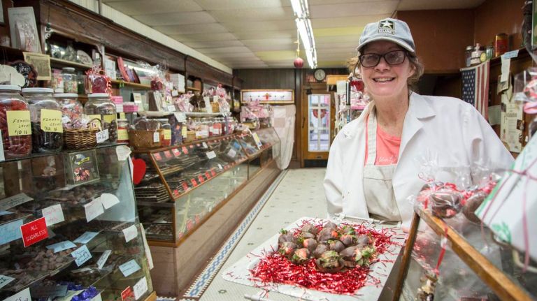 Schmidt’s Candy in Woodhaven, Queens, has been handcrafting treats since the 1920s 1 Margie Schmidt, owner of Schmidt's Candy, offers hand-dipped strawberry chocolates for Valentine's Day, on Feb. 8, 2017.