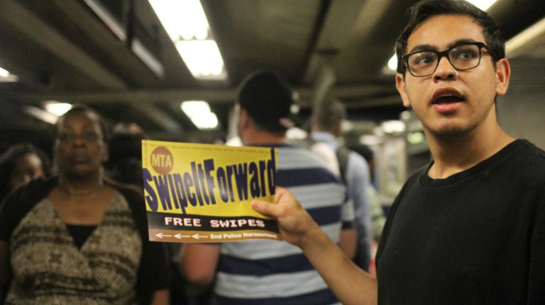 Free subway rides: See photos of protesters in Crown Heights 10 Jose Garcia, of Ice-Free NYC, invites commuters at the Crown Heights-Utica Avenue subway station to take advantage of a free MetroCard swipe on Tuesday, June 7. Garcia was one of about two dozen activists offering free subway rides as part of