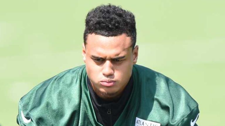 New York Jets cornerback Dexter McDougle stretches during warmups at Organized Team Activities at the Jets Training Center on Wednesday, May 25, 2016.