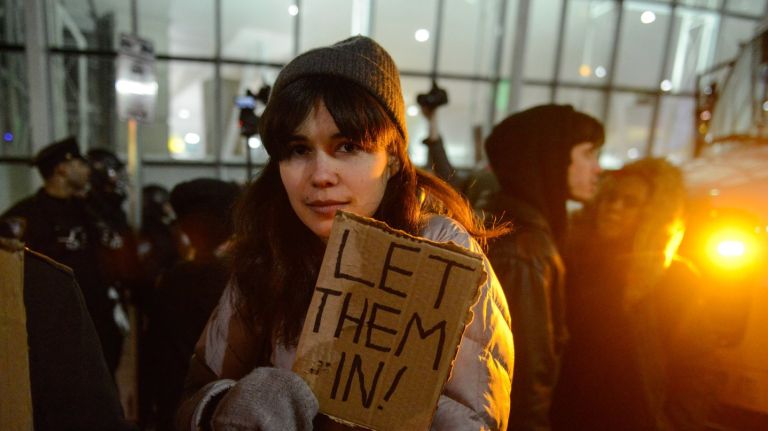 Protesters rally during a demonstration against the new immigration ban issued by President Donald Trump at Kennedy Airport  on Jan. 28, 2017,  in New York City.