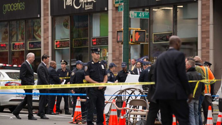 NYPD officers were on the scene of a cop-involved shooting on May 18, 2016. Police said that a knife-wielding man was fatally wounded by police after a confrontation outside of a midtown Food Emporium.