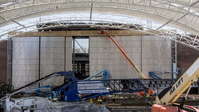 Six doors, each weighing 30,000 pounds, slide on rails to close at night and at the end of the summer season. 