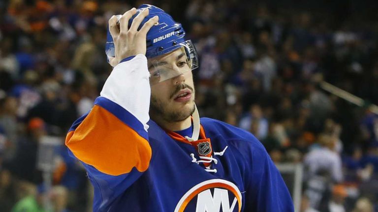 New York Islanders defenseman Travis Hamonic (3) walks off the ice after the loss in overtime in Game 3 of the Eastern Conference semifinals against the Tampa Bay Lightning on Tuesday, May 3, 2016 at Barclays Center.