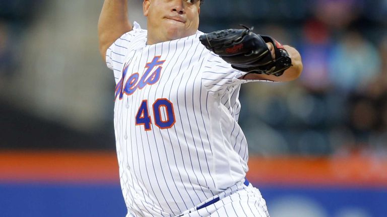 Mets vs. Braves 36 Bartolo Colon #40 of the New York Mets pitches in the first inning against the Atlanta Braves at Citi Field on Monday, May 2, 2016.