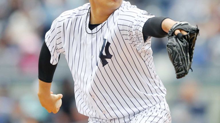 Yankees vs. Rays 104 Masahiro Tanaka #19 of the New York Yankees pitches in the first inning against the Tampa Bay Rays at Yankee Stadium on Saturday, April 23, 2016 in the Bronx Borough of New York City.