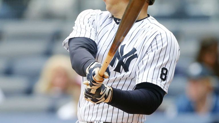 Yankees vs. Rays 106 Mark Teixeira #25 of the New York Yankees follows through on a first inning base hit against the Tampa Bay Rays at Yankee Stadium on Saturday, April 23, 2016 in the Bronx Borough of New York City.