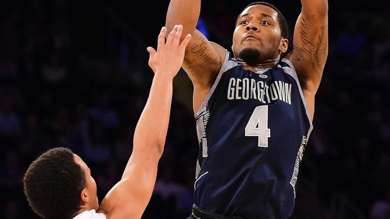 Georgetown guard D'Vauntes Smith-Rivera (4) attempts a jump shot defended by Villanova guard Jalen Brunson (1) during the Big East Tournament at Madison Square Garden on Thursday, March 10, 2016.