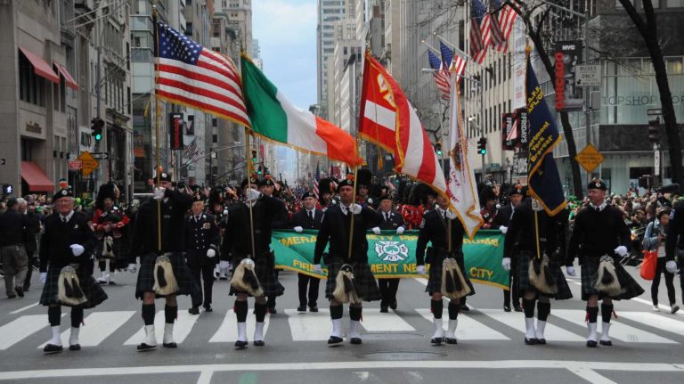 The Emerald Society Pipe and Drum Fire Department of New York City marching band plays along the parade route at the New York City St. Patrick's Day Parade on March 17, 2016.