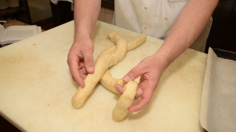 Line the ropes up next to each other and braid, pinching the ends together. 