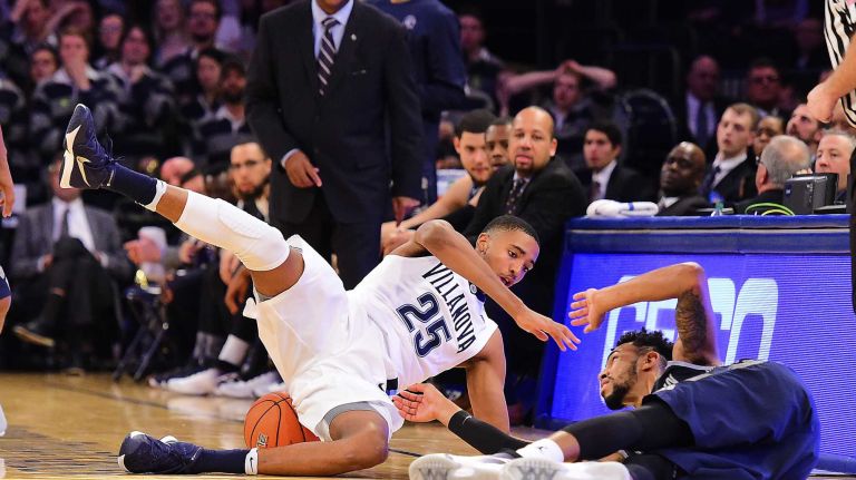 Villanova guard Mikal Bridges (25) and Georgetown guard Tre Campbell (1) battle for a loose ball during the Big East Tournament at Madison Square Garden in New York, New York on Thursday, Mar 10, 2016. Big East Basketball Tournament between #8 Georgetown and #1 Villanova.