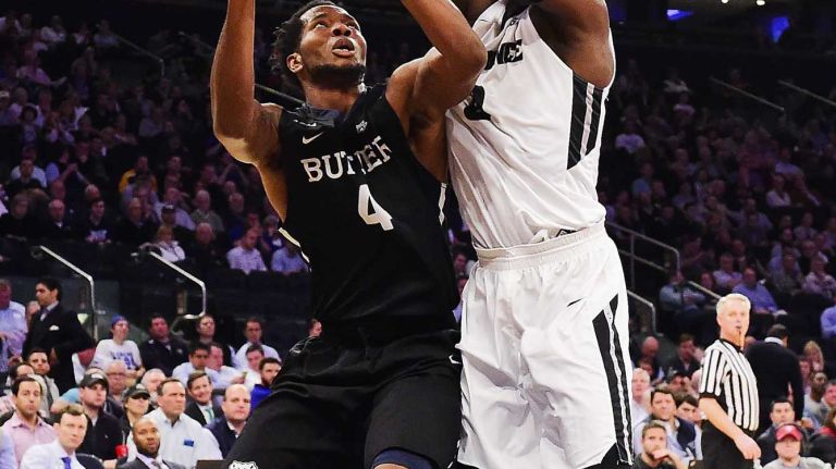 Butler forward Tyler Wideman (4) is defended by Providence forward Ben Bentil (0) during the Big East Tournament at Madison Square Garden in New York, New York on Thursday, Mar 10, 2016. Big East Basketball Tournament between #5 Butler and #4 Providence.