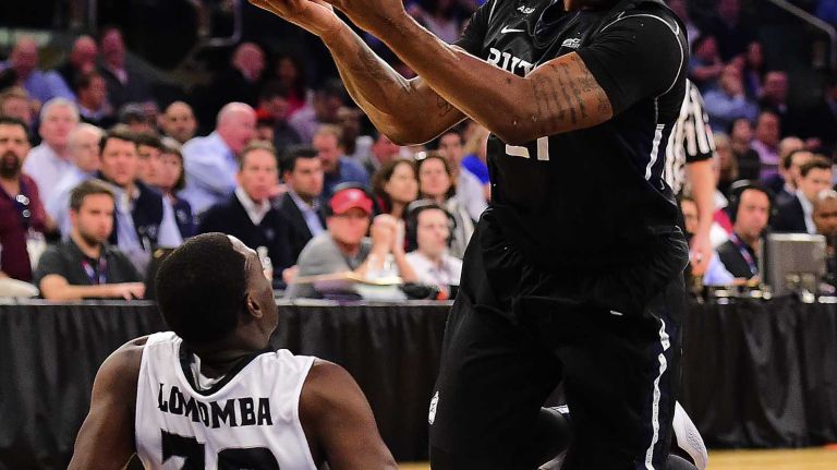 Butler forward Roosevelt Jones (21) drives to the basket is defended by Providence guard Junior Lomomba (32) during the Big East Tournament at Madison Square Garden in New York, New York on Thursday, Mar 10, 2016. Big East Basketball Tournament between #5 Butler and #4 Providence.