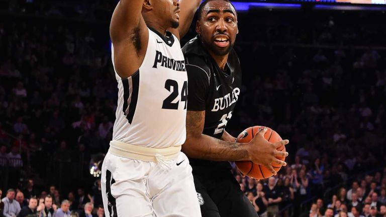 Butler forward Roosevelt Jones (21) is defended by Providence guard Kyron Cartwright (24) during the Big East Tournament at Madison Square Garden in New York, New York on Thursday, Mar 10, 2016. Big East Basketball Tournament between #5 Butler and #4 Providence.