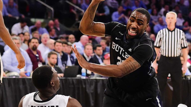 Butler forward Roosevelt Jones (21) drives to the basket is defended by Providence guard Junior Lomomba (32) during the Big East Tournament at Madison Square Garden in New York, New York on Thursday, Mar 10, 2016. Big East Basketball Tournament between #5 Butler and #4 Providence.