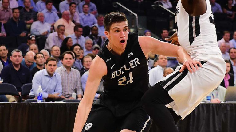 Butler guard Kellen Dunham (24) is defended by Providence guard Junior Lomomba (32) during the Big East Tournament at Madison Square Garden in New York, New York on Thursday, Mar 10, 2016. Big East Basketball Tournament between #5 Butler and #4 Providence.