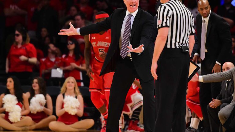 St. John's head coach Chris Mullin complains to the official against Marquette during the Big East Tournament at Madison Square Garden in New York, New York on Wednesday, Mar 9, 2016.
