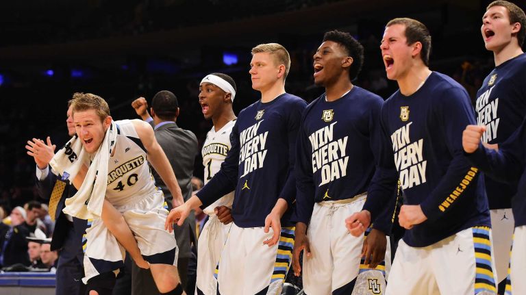 Marquette celebrates a basket against St. John's during the Big East Tournament at Madison Square Garden in New York, New York on Wednesday, Mar 9, 2016.
