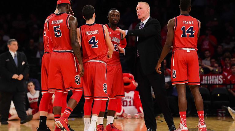 St. John's head coach Chris Mullin speaks with his team during a stoppage against Marquette during the Big East Tournament at Madison Square Garden in New York, New York on Wednesday, Mar 9, 2016. Big East Basketball Tournament between #10 St. John's and #7 Marquette.
