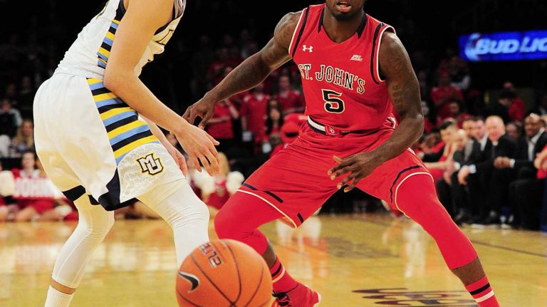 St. John's forward Durand Johnson (5) looks to pass against Marquette during the Big East Tournament at Madison Square Garden in New York, New York on Wednesday, Mar 9, 2016. Big East Basketball Tournament between #10 St. John's and #7 Marquette.