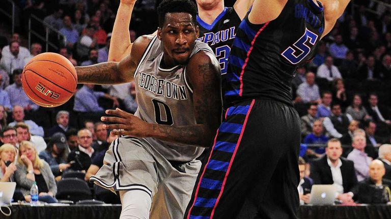Georgetown guard L.J. Peak (0) is defended by DePaul guard Billy Garrett Jr. (5) during the Big East Tournament at Madison Square Garden in New York, New York on Wednesday, Mar 9, 2016.