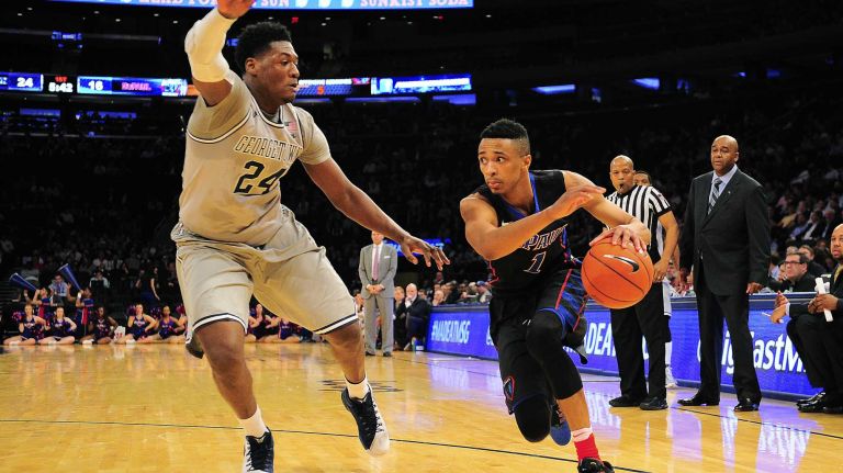 DePaul guard Darrick Wood (1) is defended by Georgetown forward Marcus Derrickson (24) during the Big East Tournament at Madison Square Garden in New York, New York on Wednesday, Mar 9, 2016.