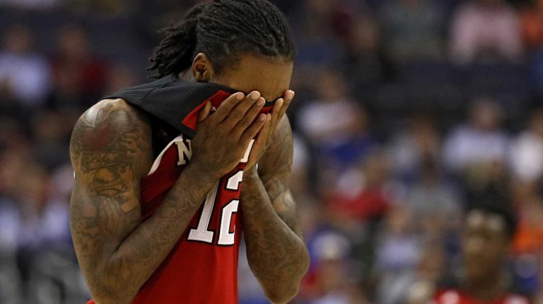 Anthony Barber #12 of the North Carolina State Wolfpack reacts against the Duke Blue Devils during the first half in the second round of the 2016 ACC Basketball Tournament at Verizon Center on March 9, 2016 in Washington, DC. 