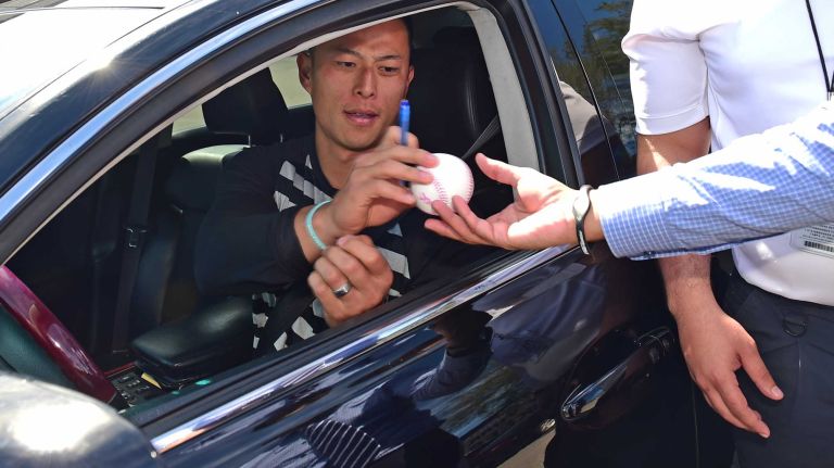 New York Yankees spring training 2016 170 New York Yankees second baseman Rob Refsnyder signs autographs as he leaves the Yankees' minor league facility in Tampa, Fla. on Wednesday, Feb. 17, 2016.