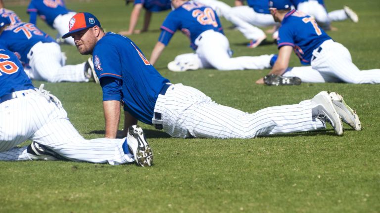 New York Mets first baseman Lucas Duda stretches on Sunday Feb. 28, 2016 during a spring training workout in Port St. Lucie, Fla.