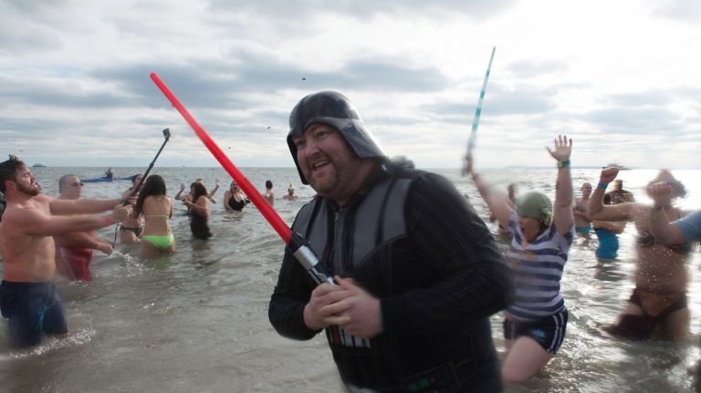 A man dressed as Darth Vader participates in the annual Coney Island Polar Bear Club New Year's Day swim on Jan. 1, 2016.