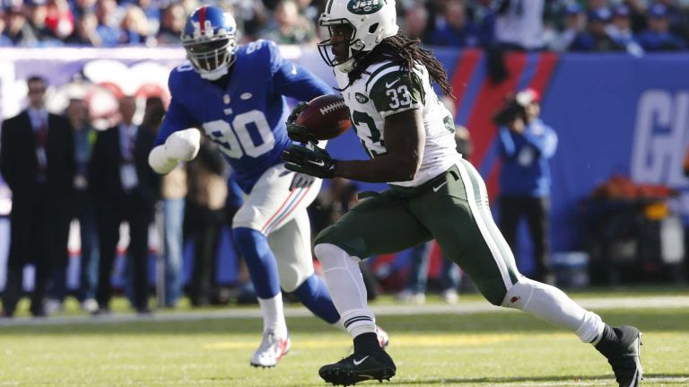 Chris Ivory #33 of the New York Jets runs with the ball against the New York Giants at MetLife Stadium on Sunday, Dec. 6, 2015 in East Rutherford, N.J.