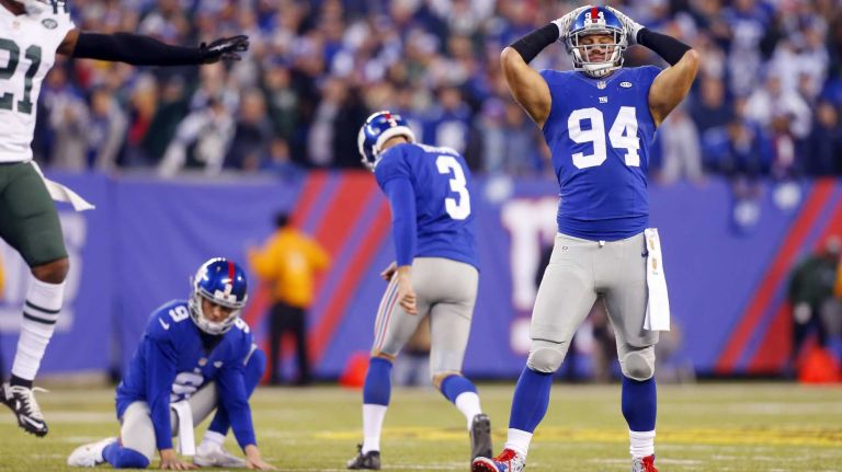 Mark Herzlich #94 of the New York Giants reacts after teammate Josh Brown #3 missed a field goal in overtime against the New York Jets at MetLife Stadium on Sunday, Dec. 6, 2015 in East Rutherford, New Jersey.