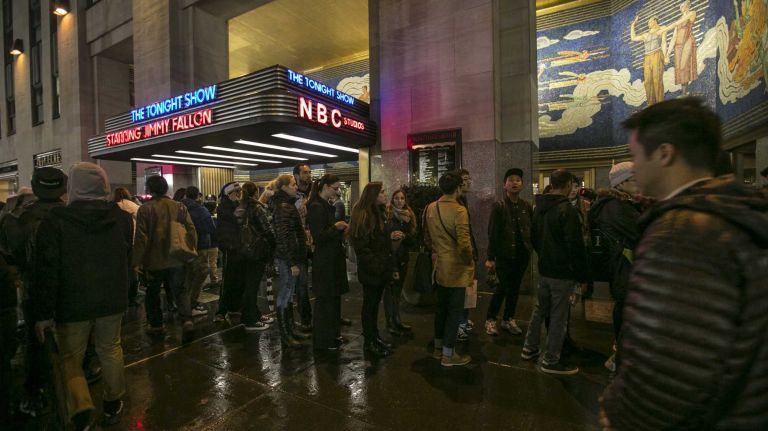 People wait in line at the Rockefeller Center Christmas tree lighting ceremony in Manhattan on Dec. 2, 2015.