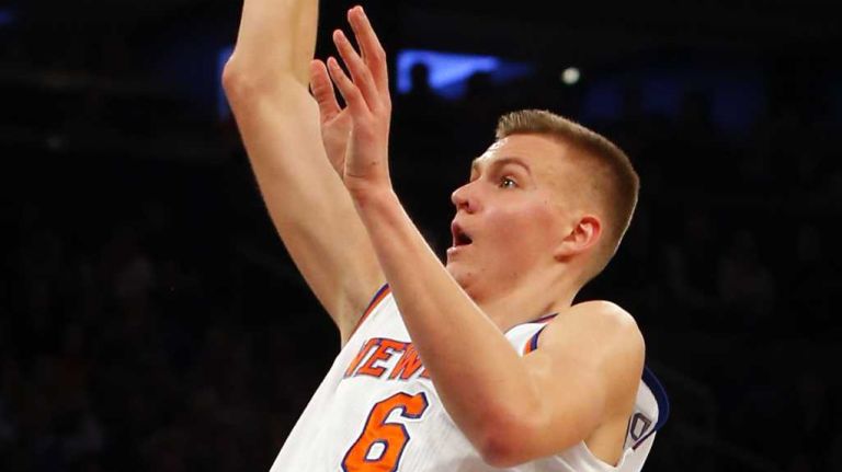 Knicks vs. Heat 20 Kristaps Porzingis #6 of the New York Knicks attempts a shot during a game against the Miami Heat at Madison Square Garden on Friday, Nov. 27, 2015.