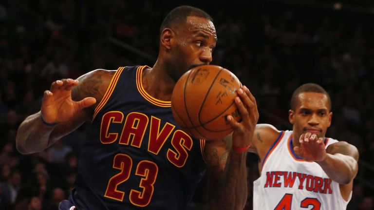 LeBron James #23 of the Cleveland Cavaliers controls the ball in the first quarter against Lance Thomas #42 of the New York Knicks at Madison Square Garden on Friday, Nov. 13, 2015.