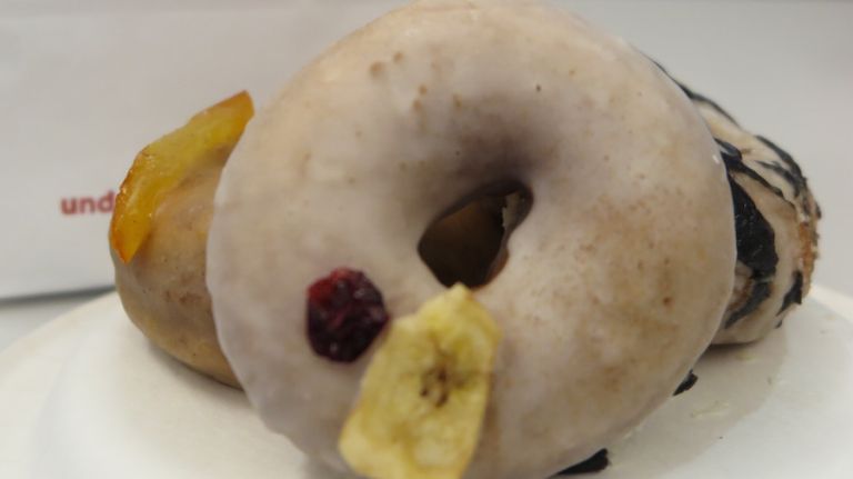 Underwest Donuts opened a new Penn Station location on Thursday, Dec. 1, 2016. Fresh treats include the Banana Milk doughnut, made with puréed bananas, coated in a banana milk glaze and topped off with a dried banana slice and cranberry garnish.