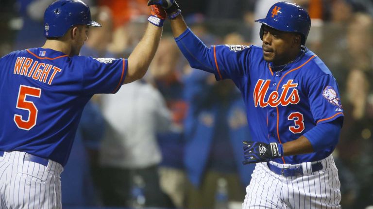 World Series Game 5: Mets vs. Royals 170 New York Mets rightfielder Curtis Granderson (3) high-fives New York Mets third baseman David Wright (5) after his first-inning home run during Game 5 of the World Series against the Kansas City Royals at Citi Field on Sunday, Nov. 1, 2015.